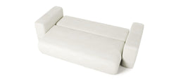 LAMBI sofa bed in white boucle fabric, showcasing its modern design and functionality as a sleeping sofa.