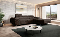 Modern living room featuring NORBERG corner sofa bed with adjustable headrests and dark fabric upholstery.