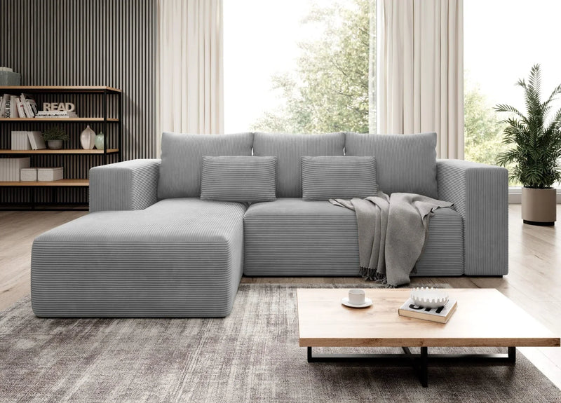 Luxurious STRIPES corner sofa bed in grey corduroy, featuring bedding container and cushions in modern living room.