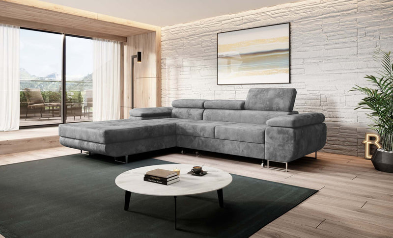 Modern Norberg corner sofa bed in a stylish living room, featuring adjustable headrests and a fold-out sleeping function.