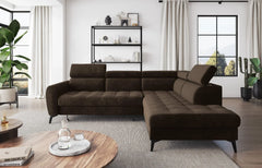 BJORN L corner sofa bed in a modern living room with adjustable headrests and quilted seats, featuring high metal legs.