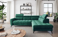 BJORN L Corner Sofa Bed in green velour fabric with adjustable headrests in a modern living room setting.