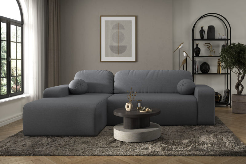 Tori Corner Sofa in gray Cloud fabric with decorative cushions in a modern living room setting