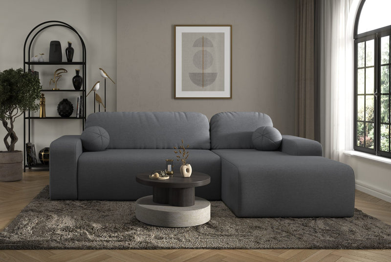 Tori Corner Sofa in dark gray Cloud fabric with chaise, decorative cushions, storage compartment, modern living room setting