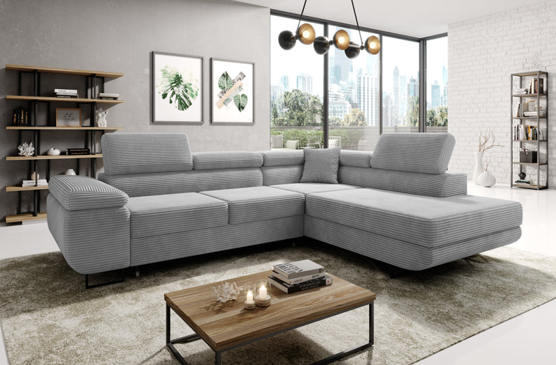 Astorp Corner Sofa Bed in modern gray corduroy fabric with adjustable headrests and spacious storage in a bright living room.