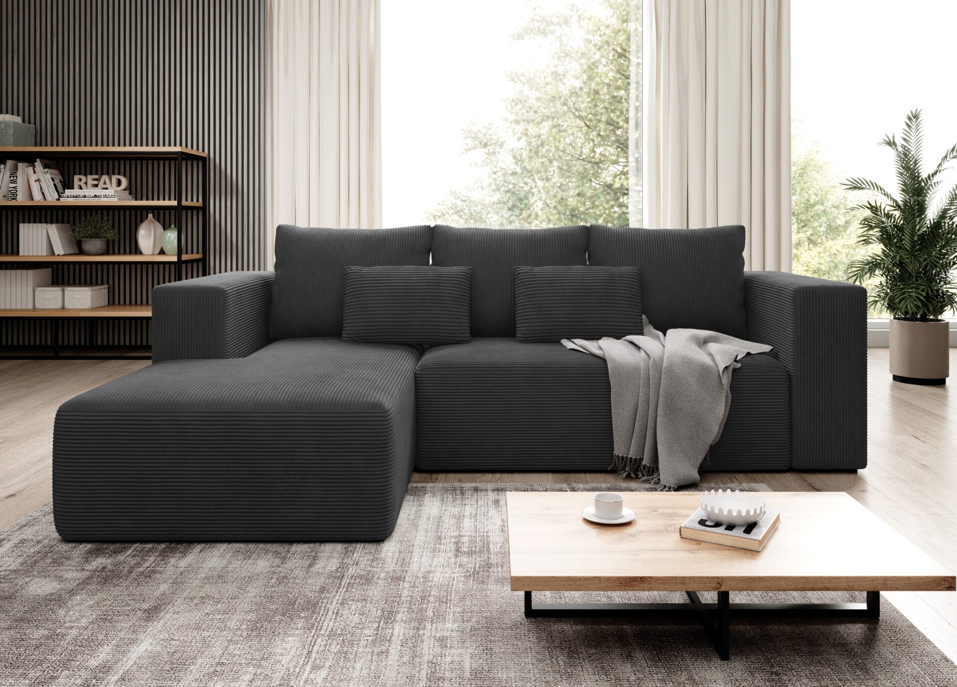 STRIPES Corner Sofa Bed in black corduroy in modern living room setting.