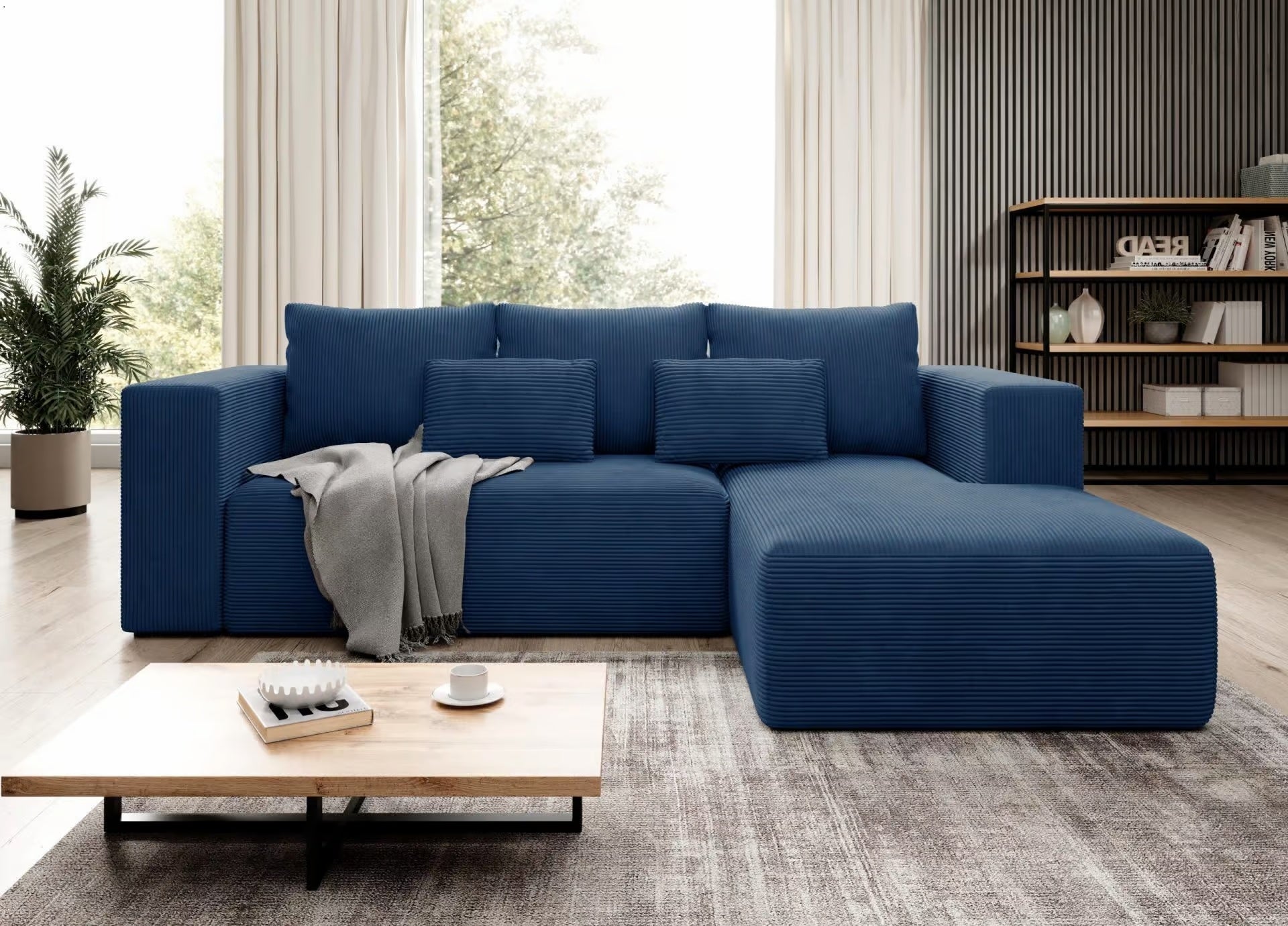 Modern blue STRIPES Corner Sofa Bed with corduroy upholstery and plush cushions in a stylish living room setting