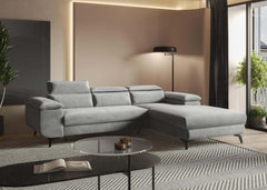 Modern FLAT corner sofa bed in a stylish living room setup.