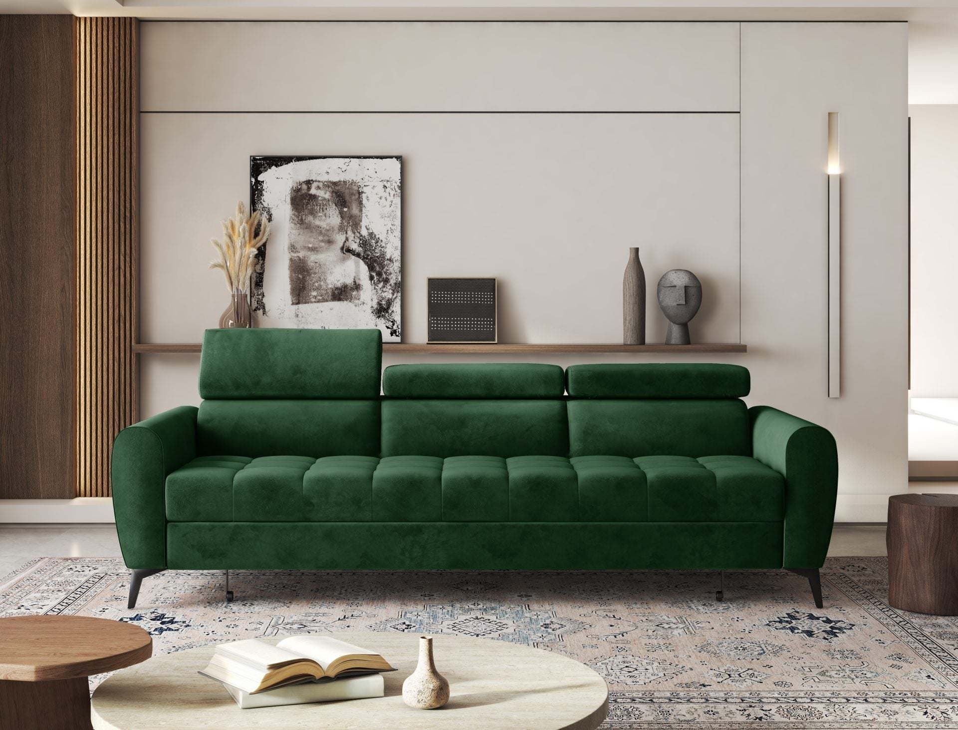 Multifunctional green BJORN sofa bed with adjustable headrests in a modern living room setting.