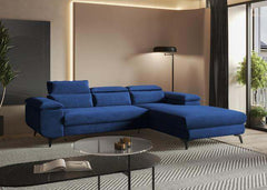 Corner sofa bed FLAT in a modern living room with adjustable headrests and blue hydrophobic fabric.
